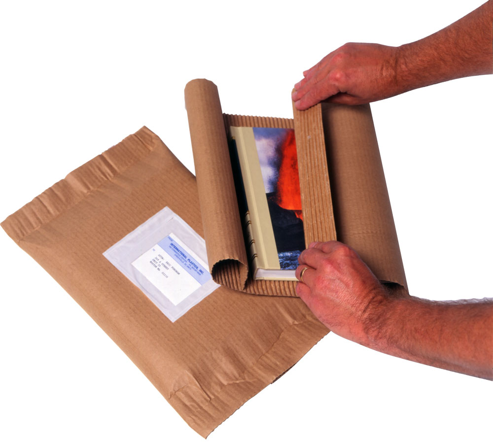 Cohesive single face packaging material